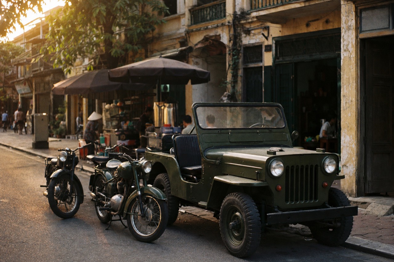 Vintage motorbikes and a jeep lined up in Hanoi's evening streets between food stops